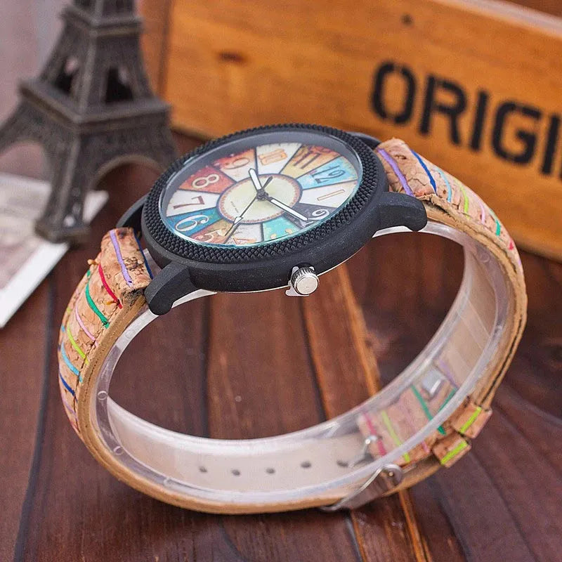 Women's vintage-style quartz watch with brown leather strap and 37mm round dial