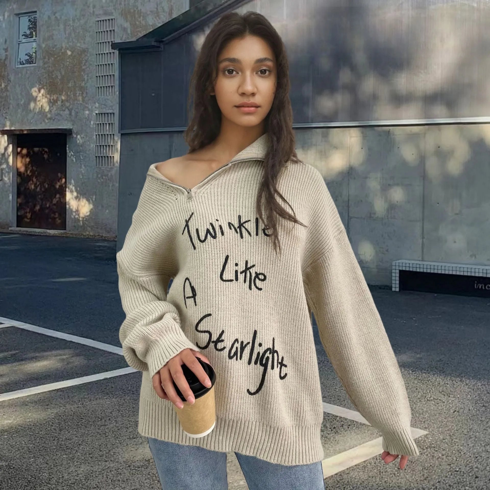Women's light khaki Alpaca wool pullover sweater with a turtleneck, loose lapels, and a diagonal oblique zipper.