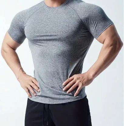 Men's cationic polyester running short sleeve top in green with tight stretch construction