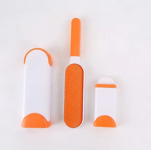 Blue reusable pet hair removal brush with self-cleaning base for furniture and clothing