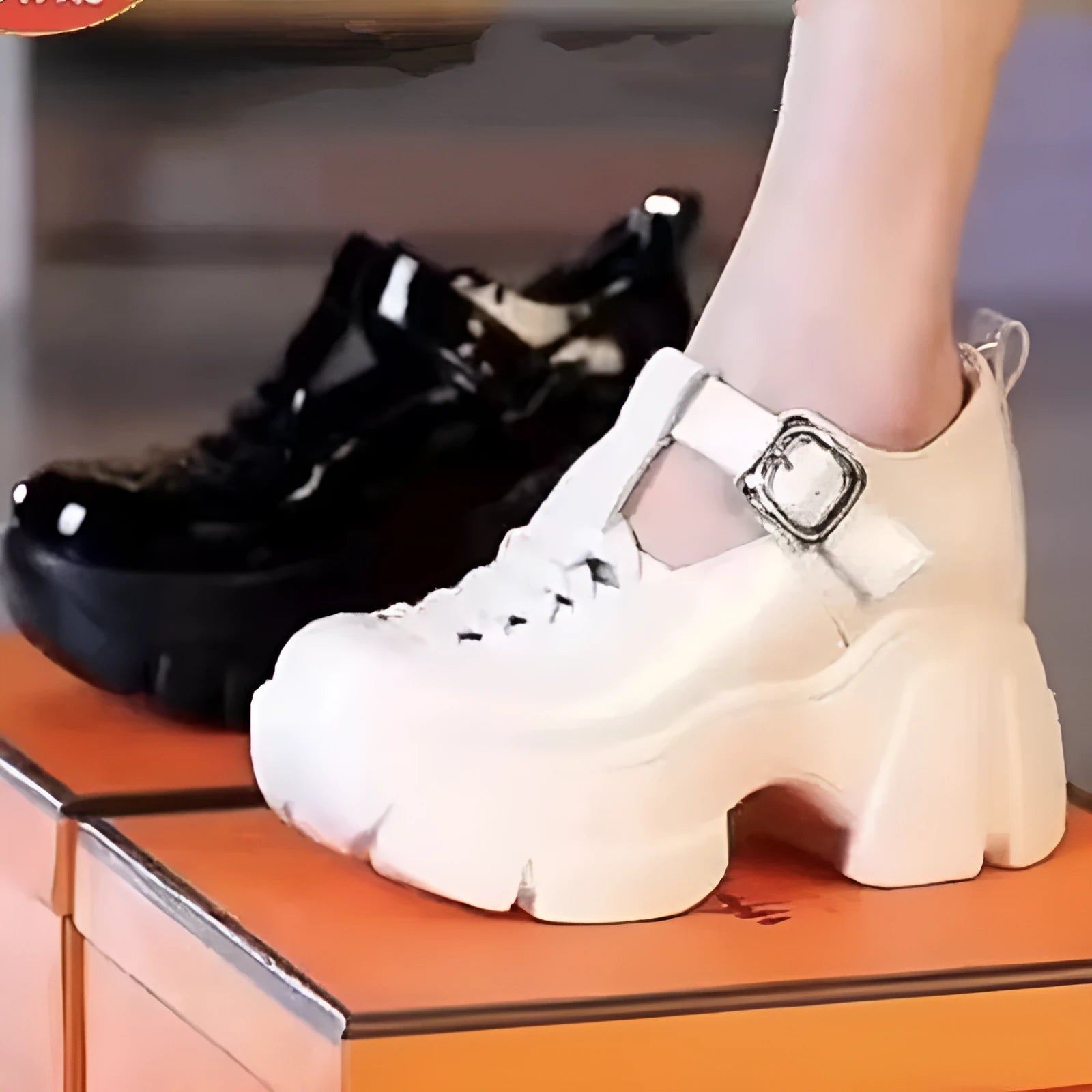 Women's black and white skull pattern pumps with a chunky wedge heel and satin upper.