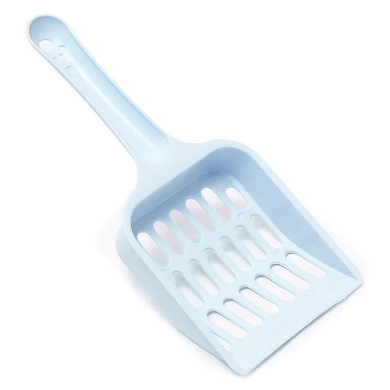 Blue plastic cat litter scoop on a white background