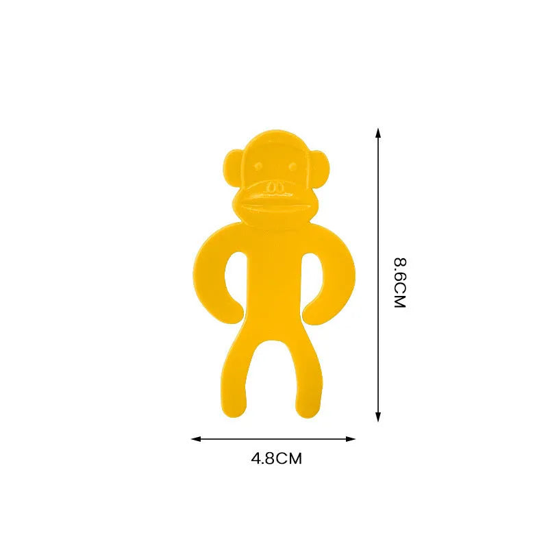 Plastic sock clips for washing machines in blue, red, and yellow colours
