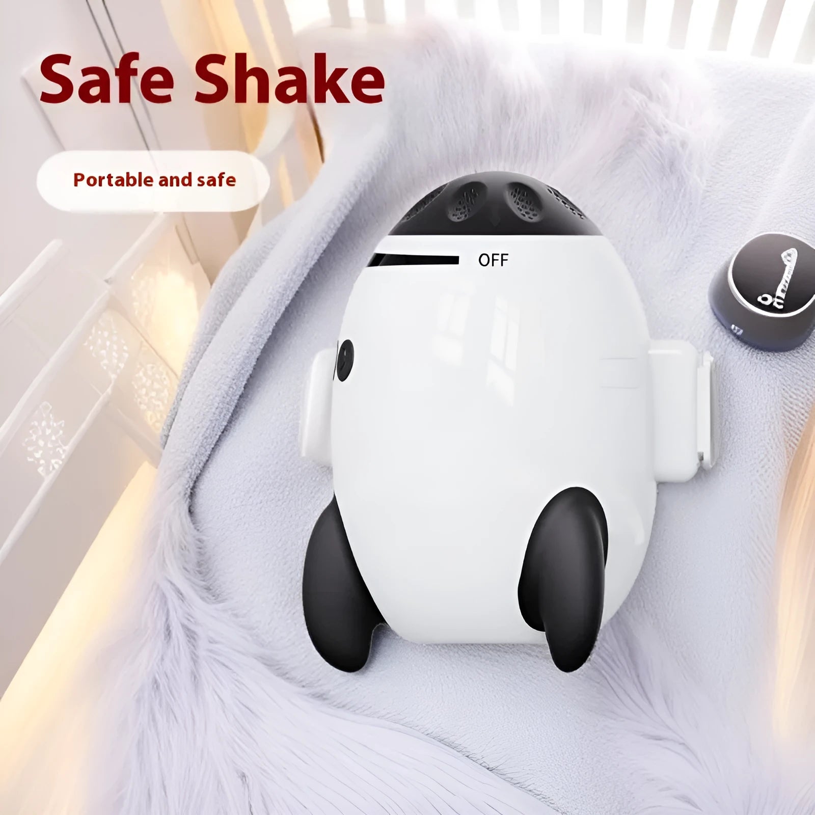 White portable baby sleep comforter shaking device with Bluetooth for white noise.