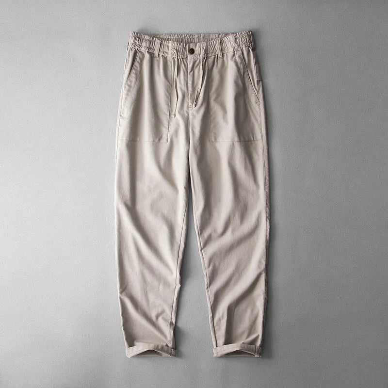 Men's linen trousers in solid colour with mid waist design for casual leisure wear