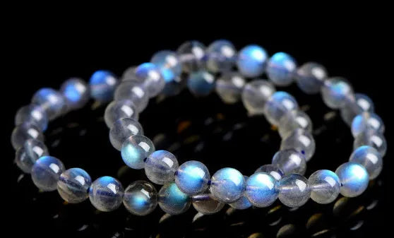 Natural cream body blue moonlight crystal bracelet showing crystal elements and simple construction