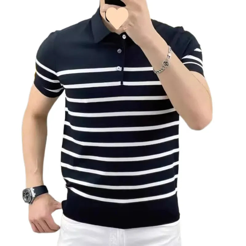 Man wearing a black and white striped knitted t-shirt with a lapel collar, showcasing a smart-casual look.