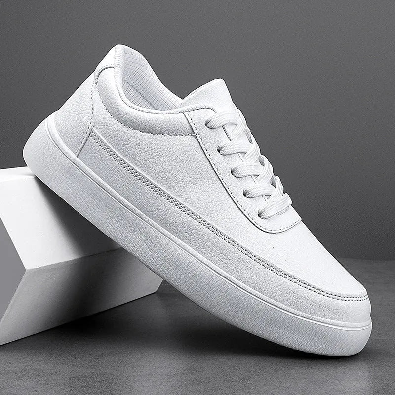 Women's white leather casual flat lace-up shoes on a light background, showing the front and side profile.