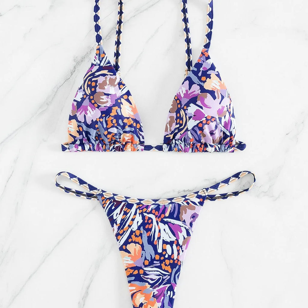 Women's floral printed polyester swimsuit with triangle bag design and briefs style bottom in S, M, L sizes