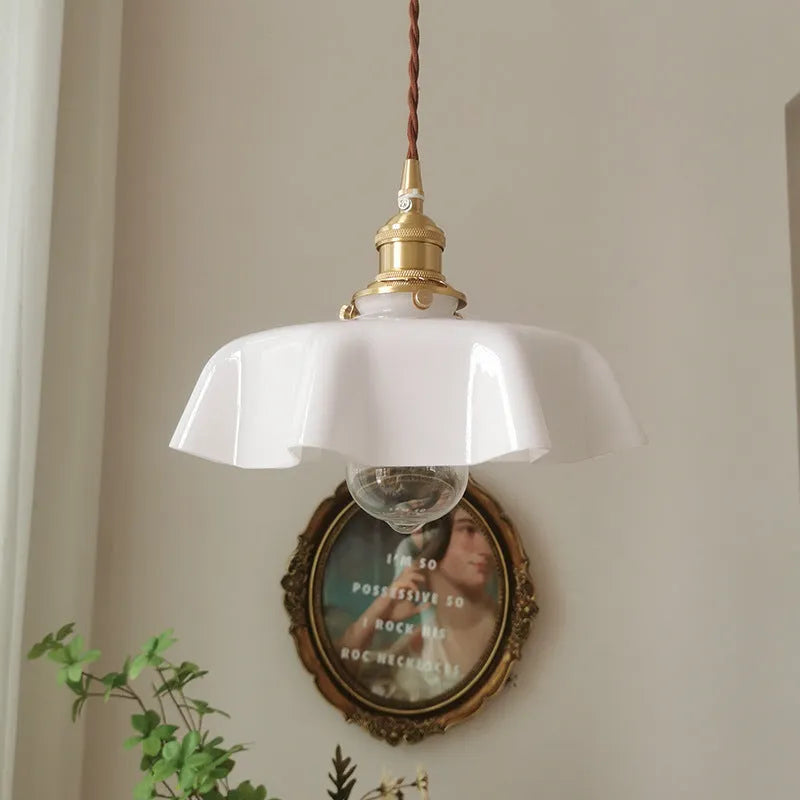 Medieval brass flower bud chandelier with adjustable height and five light colour options