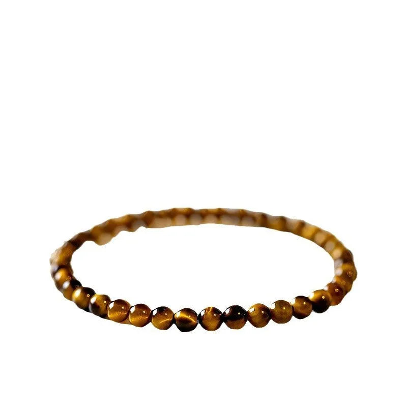 New Chinese style Tigereye bracelet with spherical beads in geometric design.