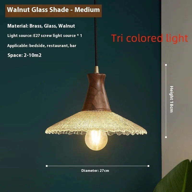 Retro-style brass and glass chandelier with wood body for ceiling mounting in restaurants.