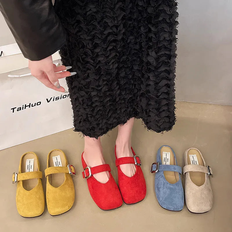 Women's flat closed toe slippers in apricot colour with a square toe and rubber sole.