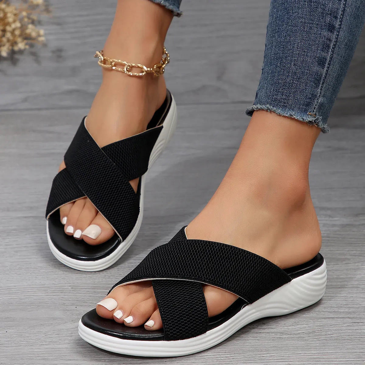 Women's black peep toe wedge slippers with a fish mouth design and thick rubber sole.