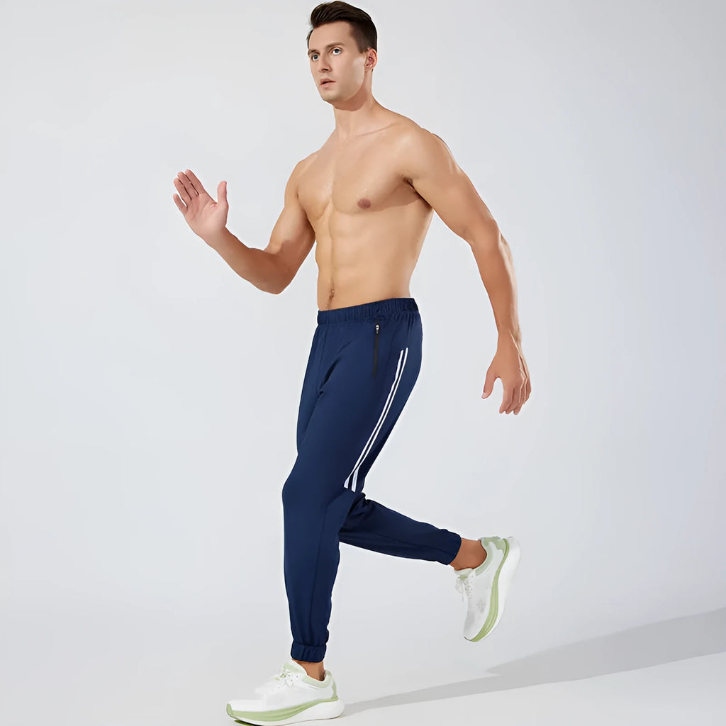 Men's black polyester running trousers with mid waist and full-length sport styling