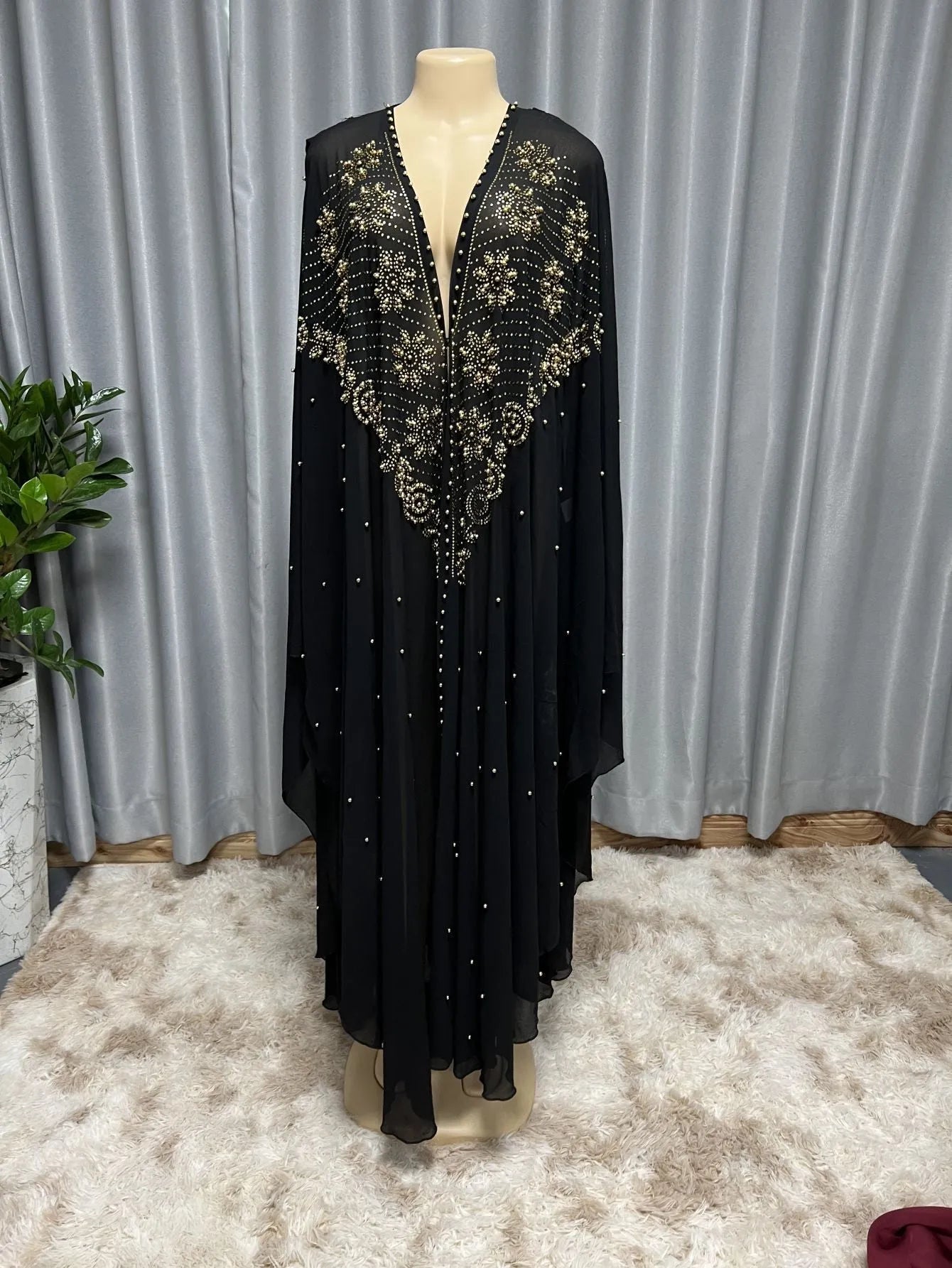 Purple chiffon shawl with rhinestone beading along edge showing draped styling
