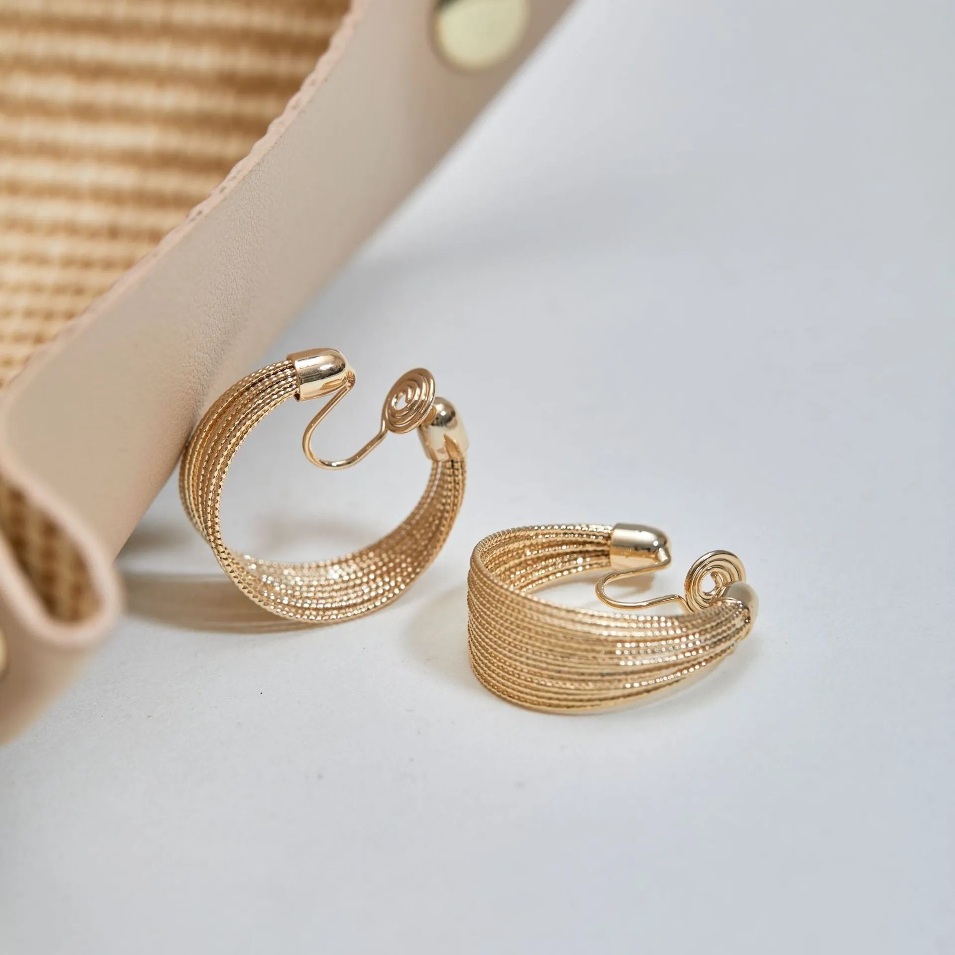 Geometric multi-layer bracelet earrings set with silver and gold colour pairs on copper