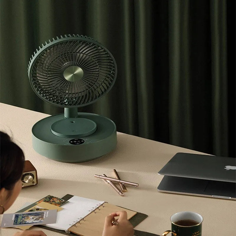 Green telescopic storage floor electric fan showing desktop and extended floor-standing configurations with remote control