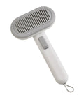 Large pet hair removal comb in light grey with stainless steel teeth and one-click knot remover.