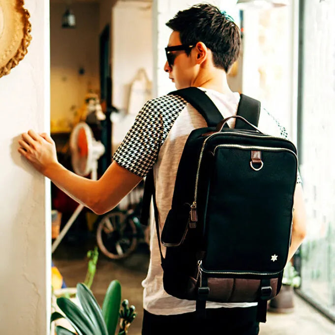 Modern men's Oxford cloth backpack in Army Green colour, showing its large main compartment.