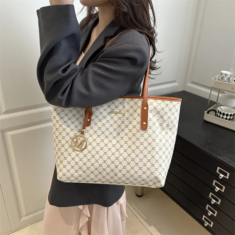Western style PU leather shoulder bag showing sewing thread detailing, 42cm wide by 28cm tall, available in black, grey, white, and brown colours
