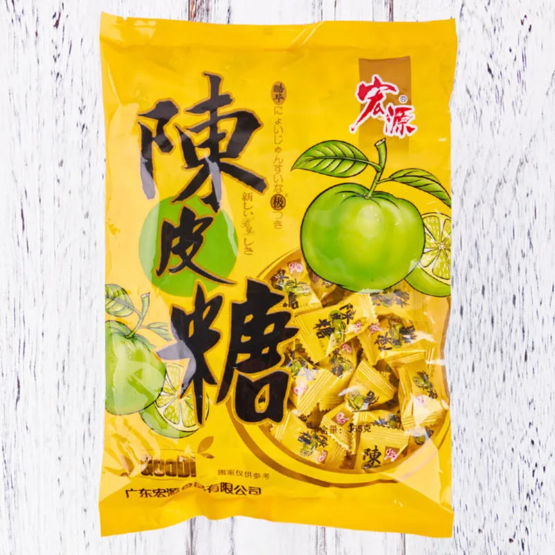 Three bags of hard candy: plum sugar, guava and tangerine peel flavours in 350g and 355g sizes