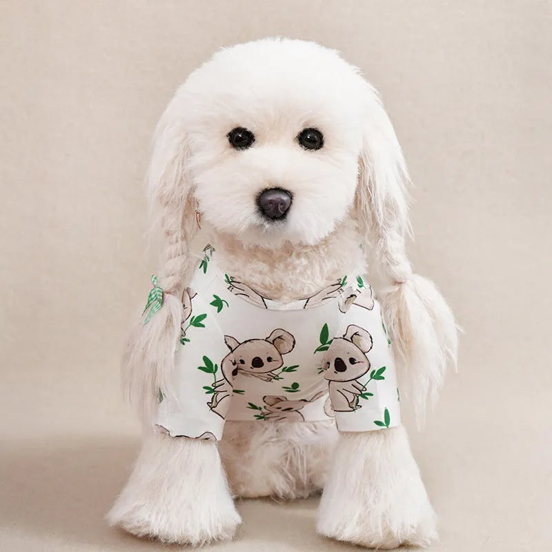 Full-print polyester t-shirt for a small dog, shown in one of six colour variants, with size chart for S, M, L, XL, XXL.