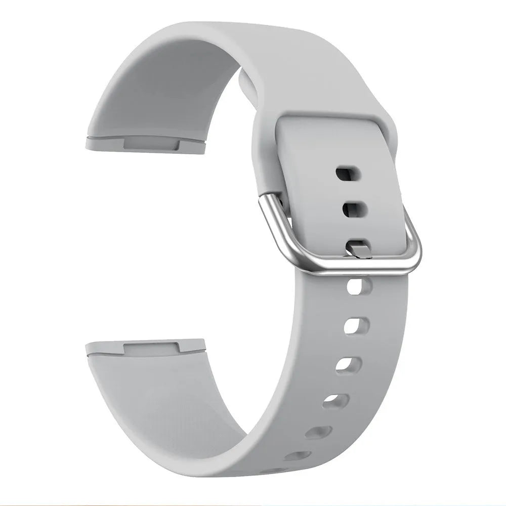 Solid colour silicone strap with silver buckle for Fitbit Versa 3 and Sense 2 watches.