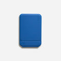 Black magnetic mobile phone case with integrated kickstand deployed, showing slim profile and leather finish.