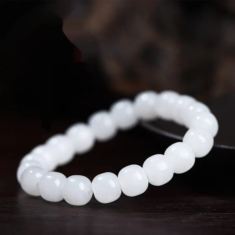 White Hetian jade barrel bead bracelet showing three size options: 5x6mm, 7x8mm, and 8x10mm beads.