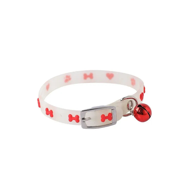 Glow in the dark cat collar with adjustable chain in paw print, love, fishbone, or footprint design.