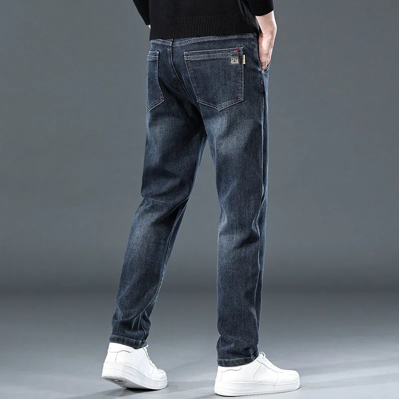 Slim straight casual trousers in blue grey colour with mid-waist design and micro-elastic fabric