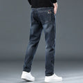 Slim straight casual trousers in blue grey colour with mid-waist design and micro-elastic fabric