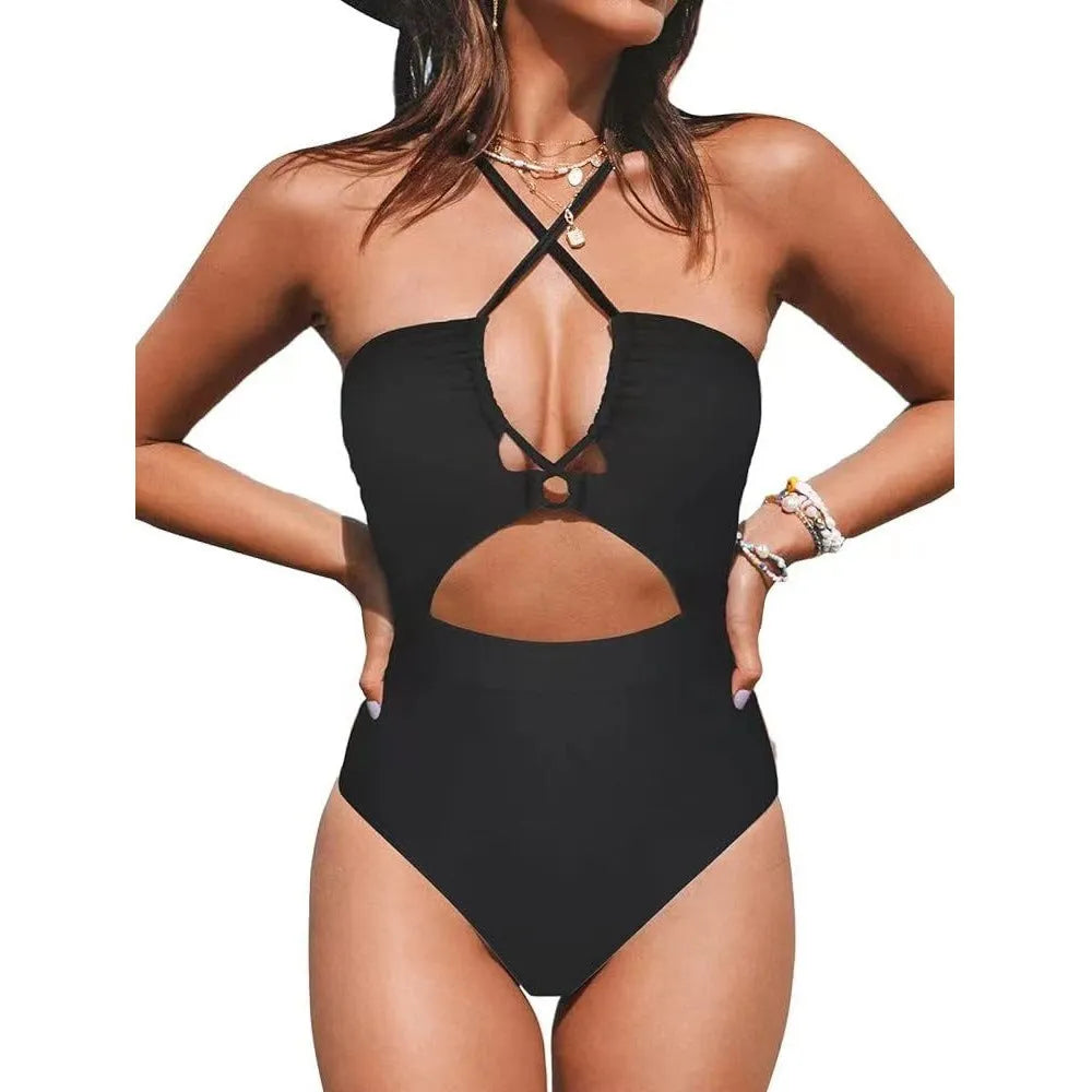 Women's black one-piece backless swimsuit made from polyester and spandex on a mannequin.