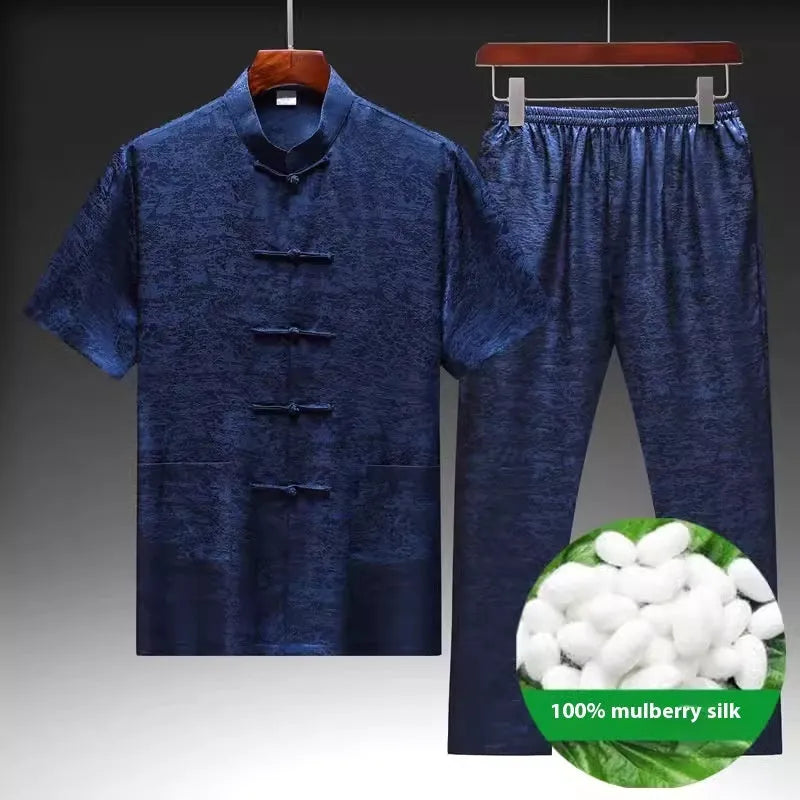Men's light green mulberry silk Tang suit jacket and trousers set on a hanger.