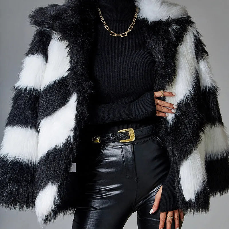 Minimalist women's faux fur coat with contrast colour lapel and a detachable fur collar.