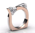 Rose gold geometric women's ring with zircon stones on a white background.