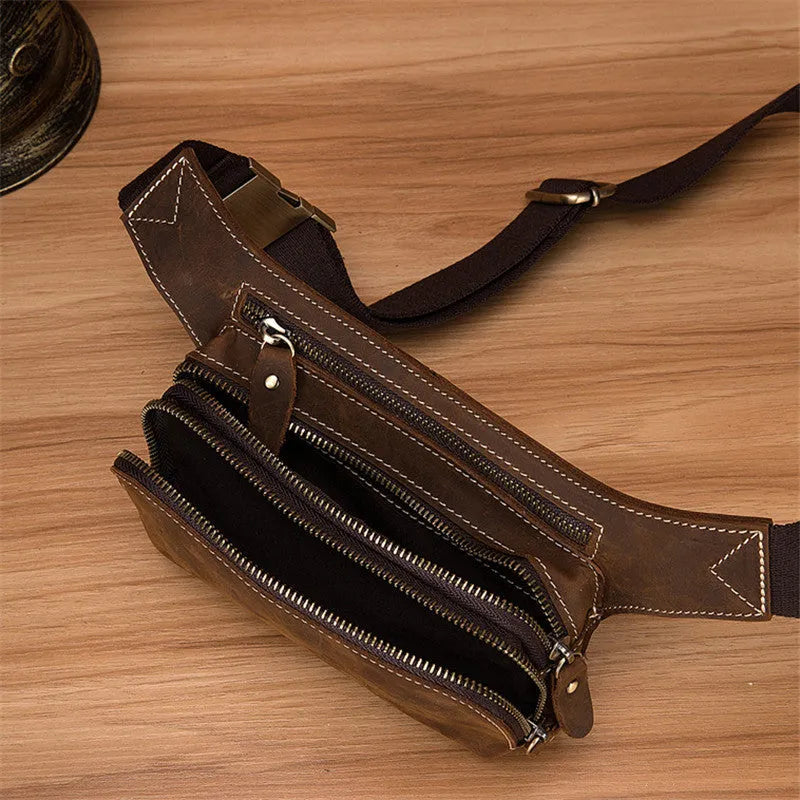 Brown top layer cowhide men's sports waist bag with zipped closure shown from front