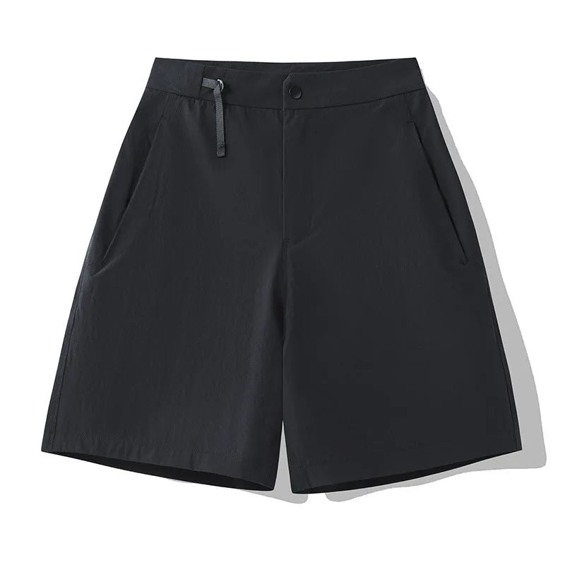 Men's khaki quick-drying sports shorts with 3D elastic cutting on a grey background.
