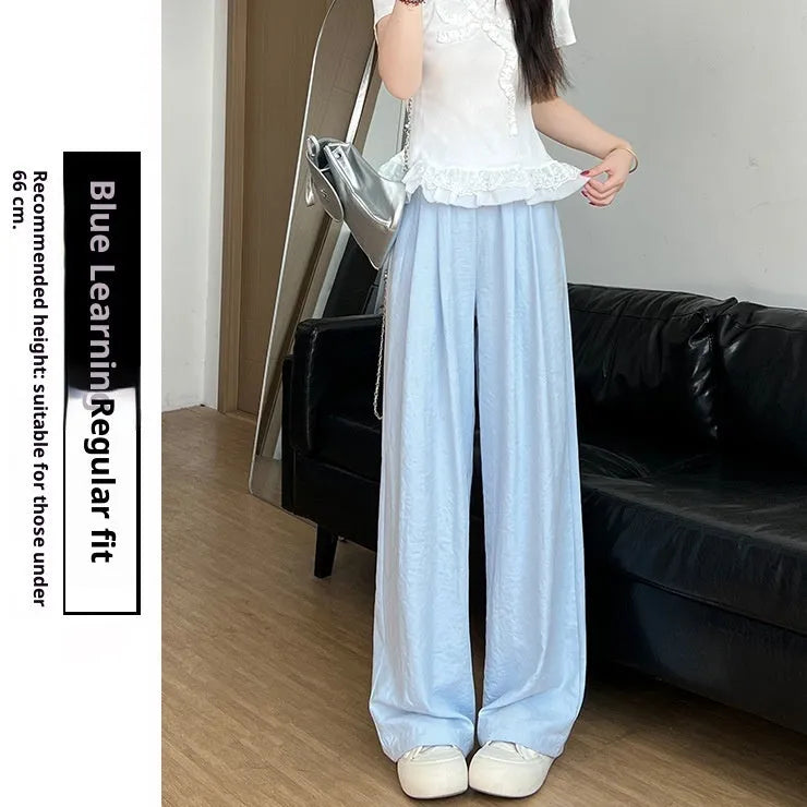 Casual high waist wide leg trousers in milky white, pleated front, loose fit design for women
