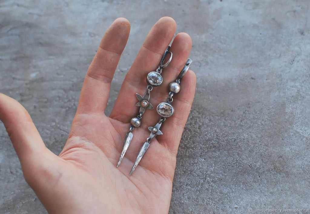 Geometric antique silver earrings with long rhinestone pendants and XINGX design
