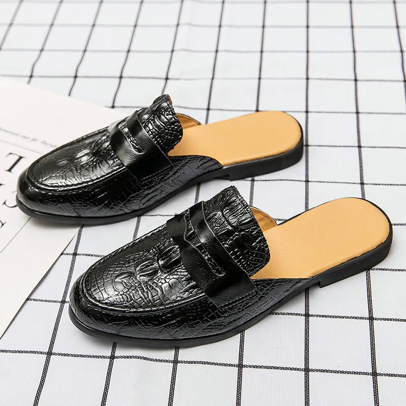 Men's closed toe half-support crocodile pattern PU leather slippers in black, side view