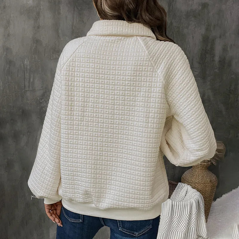 Women's solid colour thick sweater with a textured polo collar, shown in milky white.
