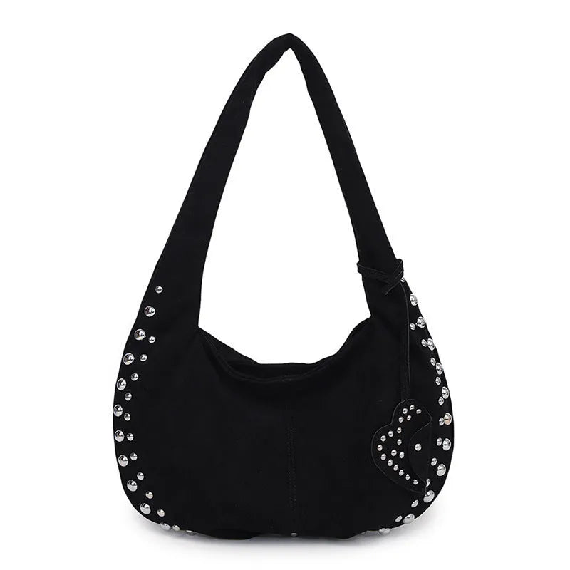 Soft plush retro tote handbag for women in a choice of colours, shown with strapless underarm carry.