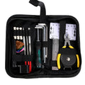 Black plastic case open to show guitar repair and maintenance tools inside.
