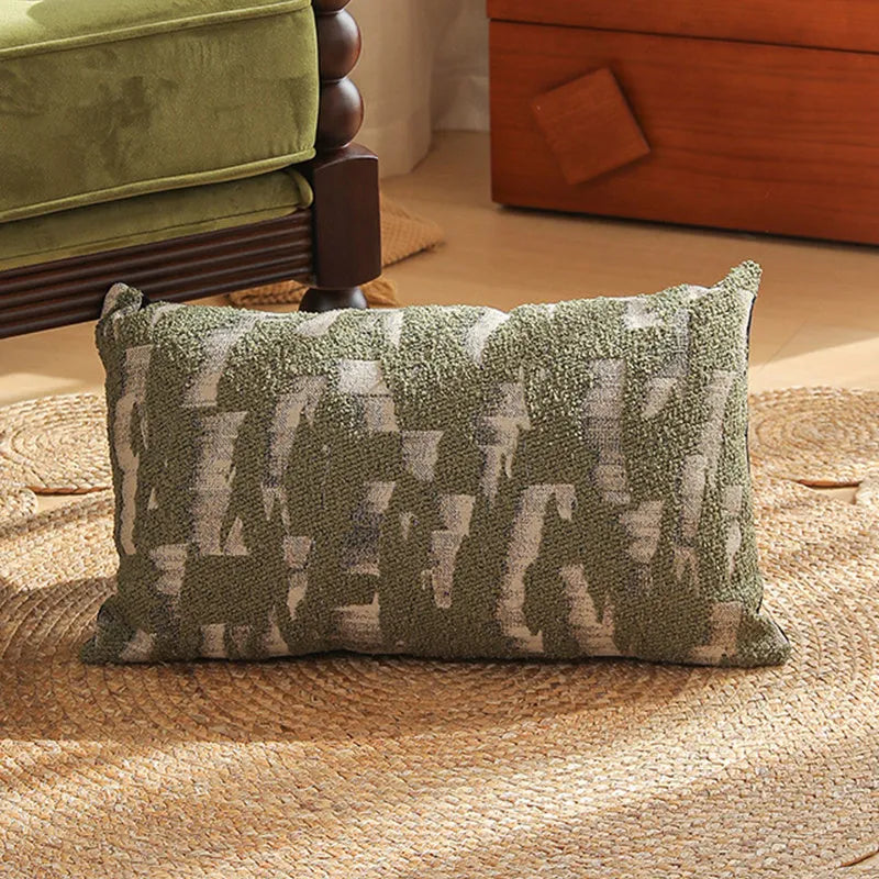 Jacquard floral pattern cushion cover in a retro colour, 45cm square, on a sofa.