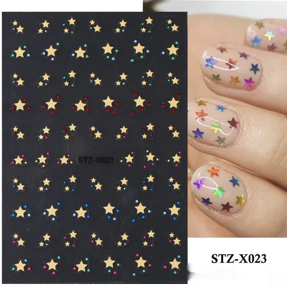 Sheet of black and silver love heart pattern nail art stickers with a plastic nail patch.