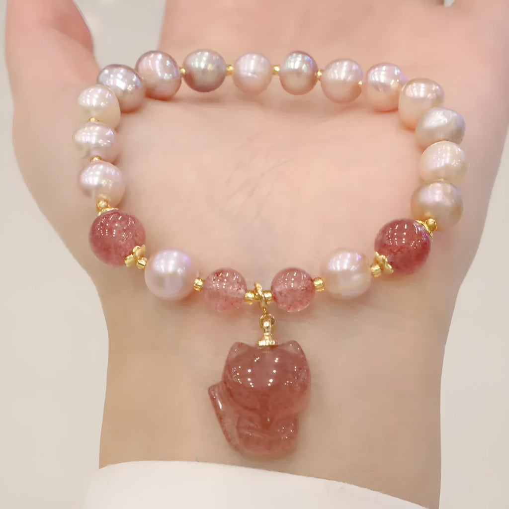 Women's natural freshwater pearl bracelet light pink colour with fox charm on wrist