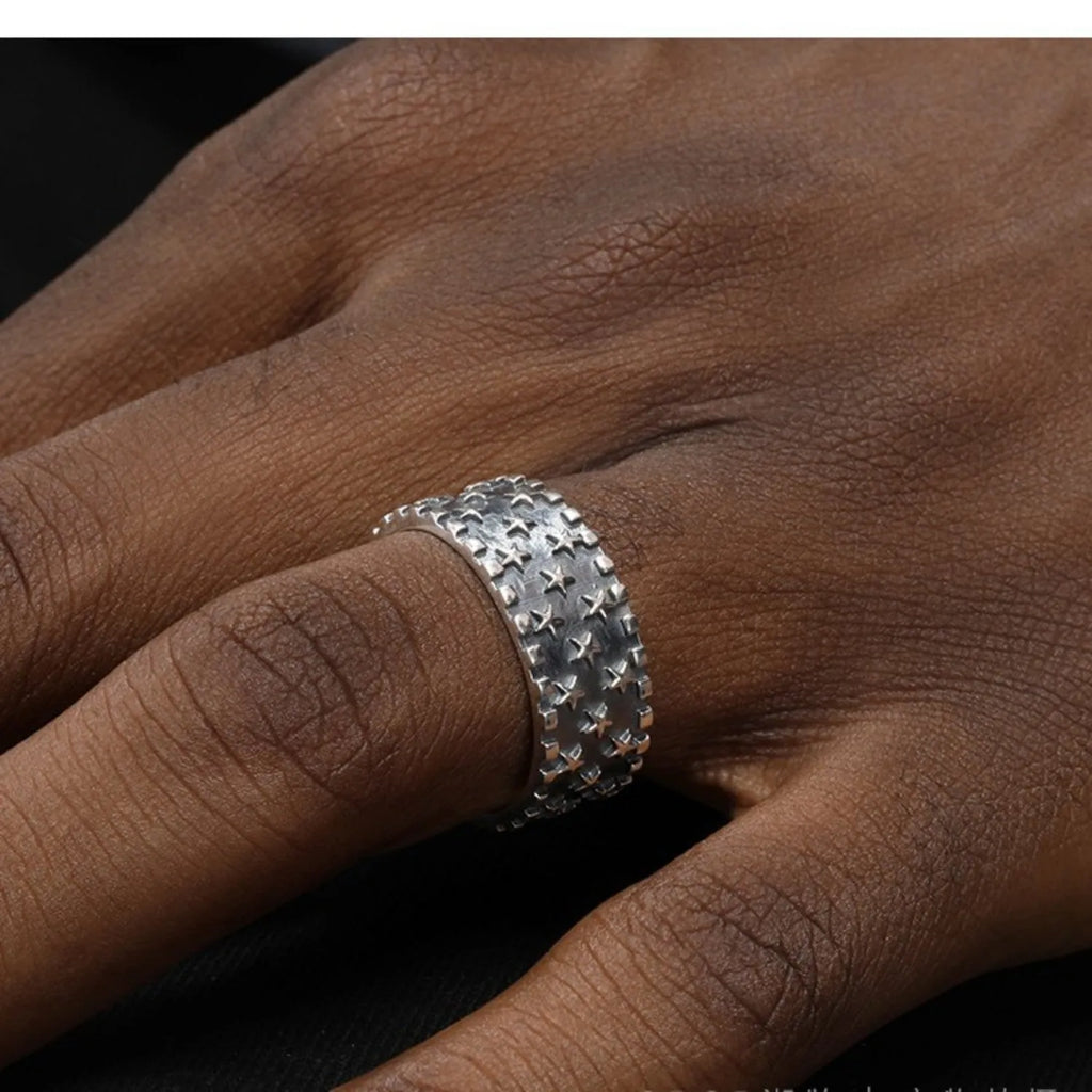 Five pointed star geometric ring made from 925 silver with an adjustable open band.