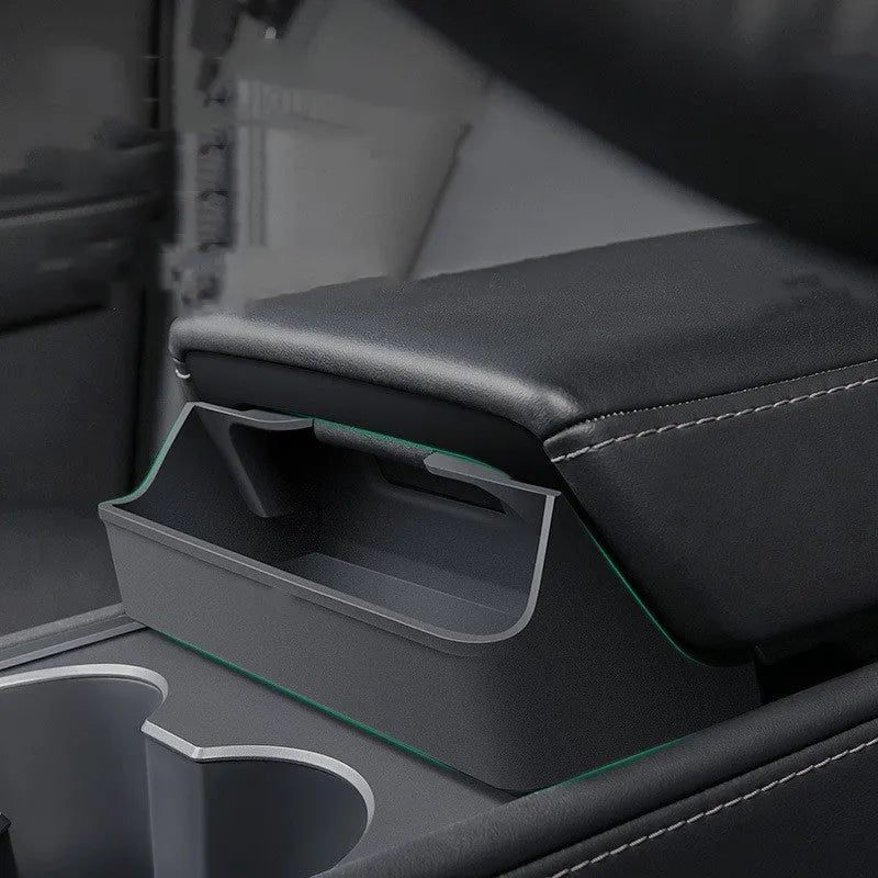 Black silicone glasses case mounted on Tesla Model 3 centre console